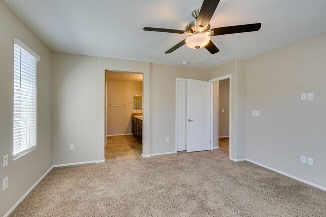 Building Photo - Spacious Townhouse with Loft & Rare 3-Car Garage!