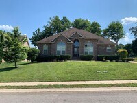 Building Photo - Luxury Living! Beautiful Brick Home in Sango with 3 car garage.