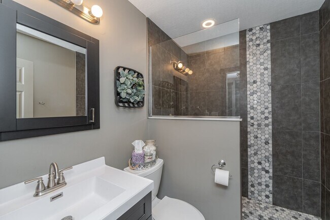 Building Photo - Spacious Home With Finished Basement And 3 Car Garage