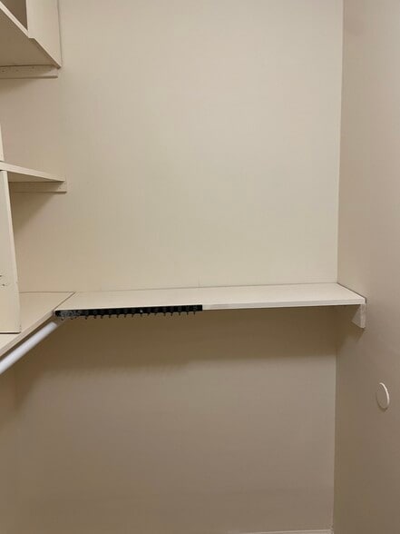 Walk-in closet (bedroom 2) - 18308 Streamside Drive