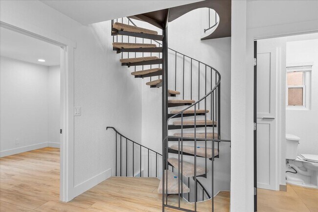 Building Photo - COMPLETELY REMODELED, BRIGHT & AIRY, TRI-LEVEL HOME W/ TOP-FLOOR GREAT ROOM LIVING SPACE, 2-CAR G...