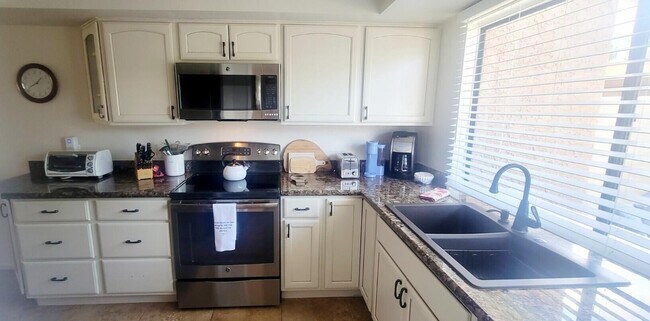 Building Photo - 5794 Los Coyotes Dr