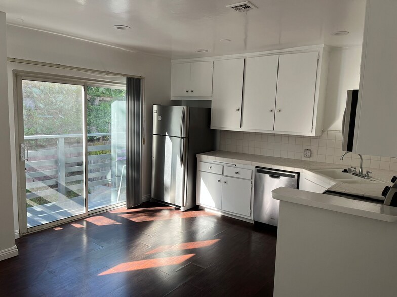 Kitchen with Balcony - 8315 W Manchester Ave
