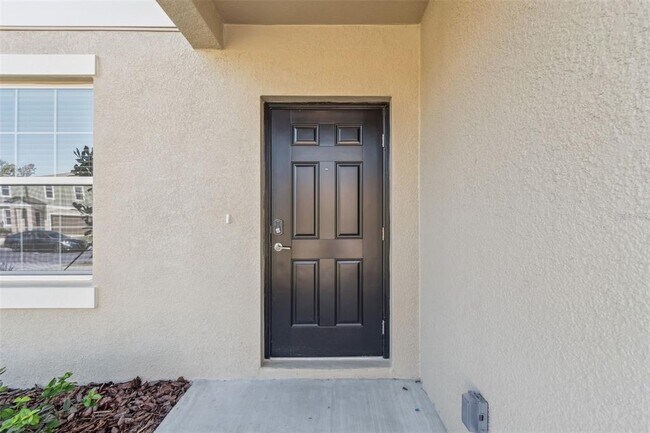 Building Photo - 1712 Tropical Oasis Ave