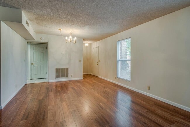 Building Photo - Coming soon! Nice remodel of townhouse Condo in Harbour Town. Gated complex!