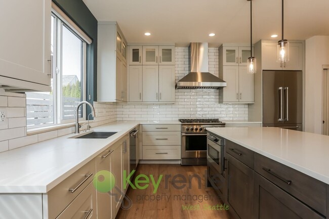 Building Photo - Spacious Living with Balconies, Deck, and Private Yard