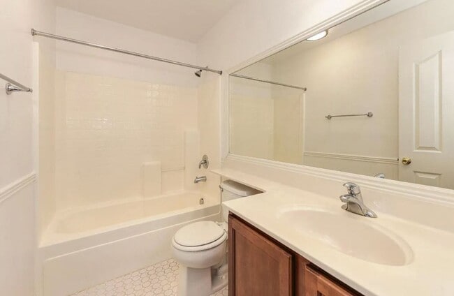 Building Photo - Experience Esplanade! Premier Townhome Com...