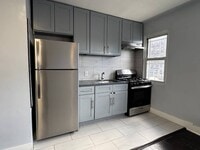 Building Photo - 1254 White Plains Rd