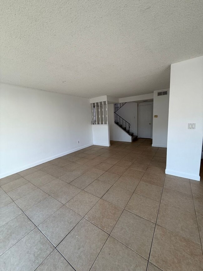 Building Photo - Long term Condo