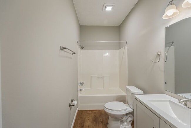 Building Photo - Like New Home off Freeman Mill. Just Painted, New Wood/Vinyl Flooring, Vaulted Ceilings, Front Po...