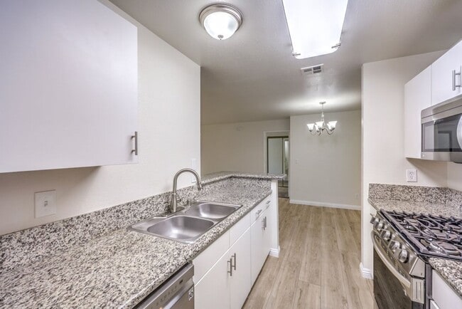 Building Photo - Fully Renovated Canyon Gate Condo | Guard Gated | Resort-Style Living