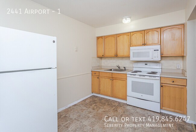 Building Photo - 2441 Airport-1