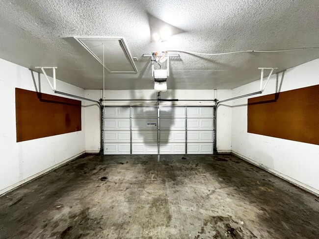 Building Photo - Available NOW!!!! This beautiful 2 story, 4 bedroom, 2 bath, two car garage with garage door open...
