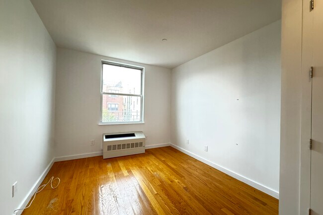Building Photo - 51 E 128th St