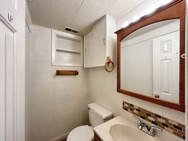 Downstairs 1/2 bathroom - 6985 W 48th Ave