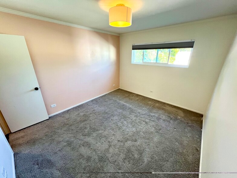 Bedroom #3 painted white - 721 Cedar St