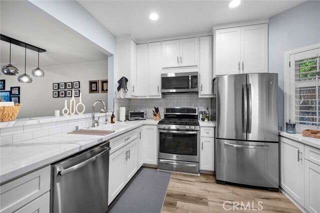 Building Photo - 13041 Moorpark St