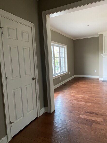 First floor open living, dinning and kitchen - 303 Landon Way