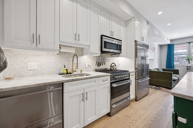 Building Photo - Renovated 2bed-2bath Near H-Street with Private Deck & EV Parking!