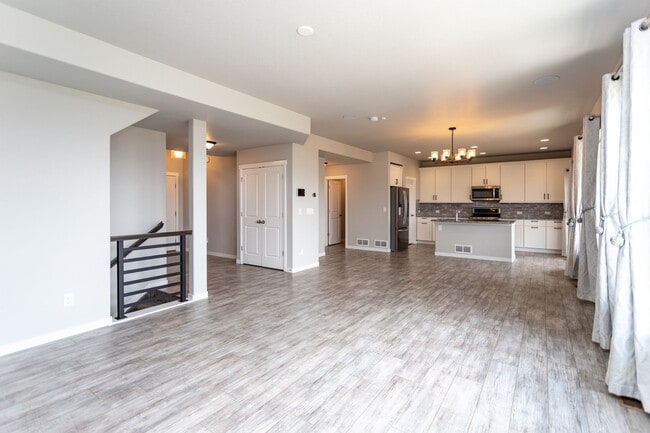 Building Photo - Spacious 5-Bedroom Home with Finished Base...