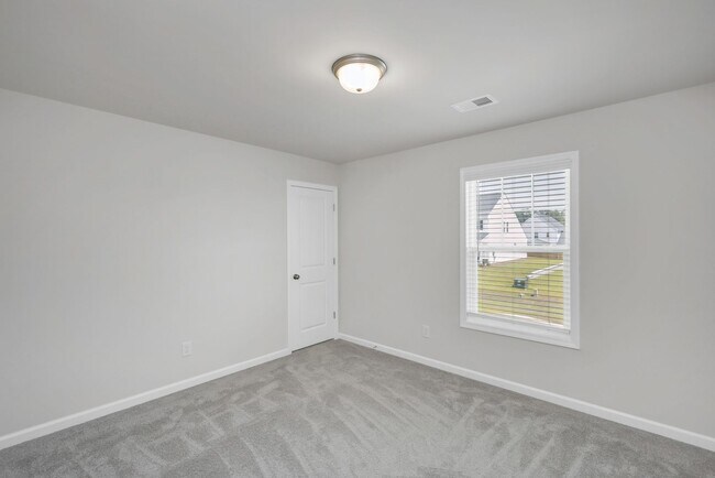 Building Photo - Sophisticated Like-New 4-Bedroom Home with Designer Finishes & Fenced Backyard!
