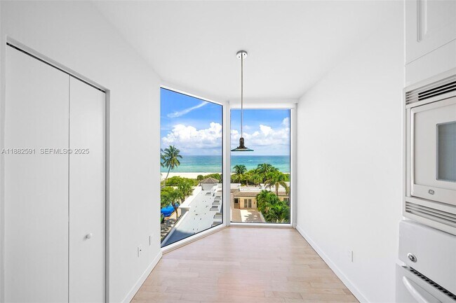 Building Photo - 4779 Collins Ave