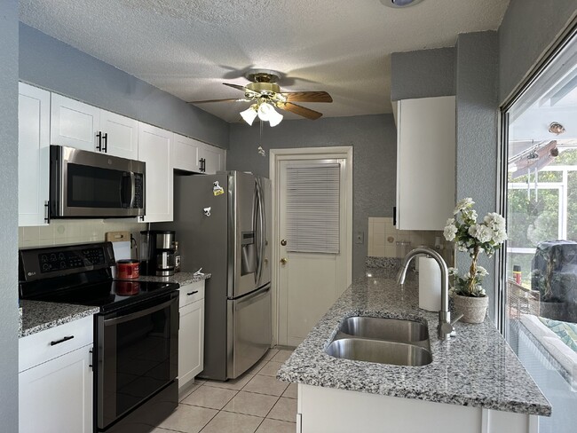 Building Photo - "Charming Furnished 2 Bed, 2 Bath Home wit...