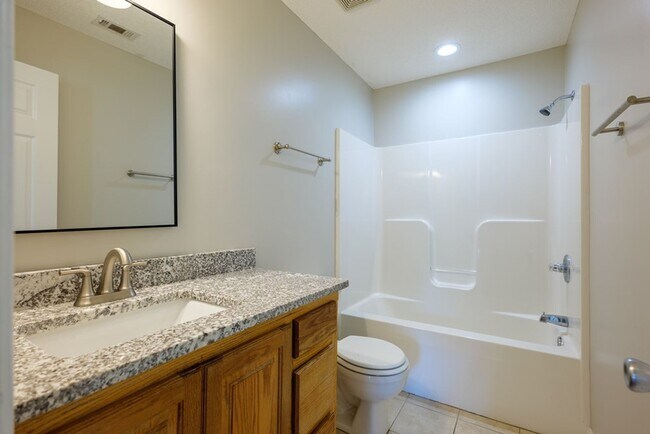 Building Photo - Inviting 3BR Home with Open Split Floor Plan, Fenced Yard & Covered Porches in Northlake