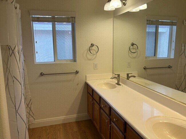 Building Photo - New flooring and freshly painted 4 bedroom home