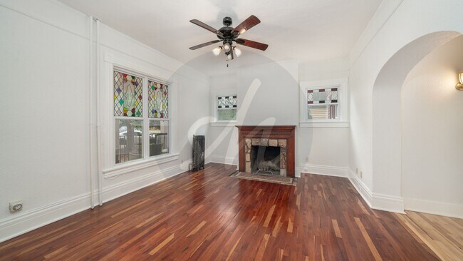 Building Photo - Updated 2-Bed Victorian Main-Floor Living with Stained Glass & Jetted Tub