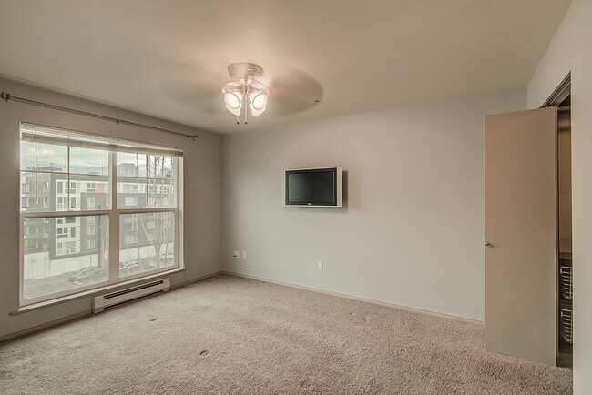 Building Photo - Top floor corner one-bedroom in the heart of it all, don't miss out, tour today!