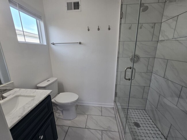 Building Photo - Welcome to The Buchanan Retreat – Modern 4...