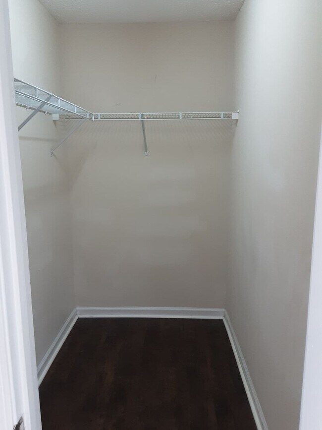 Building Photo - 1/2 off First Month Rent home has new flooring throughout.