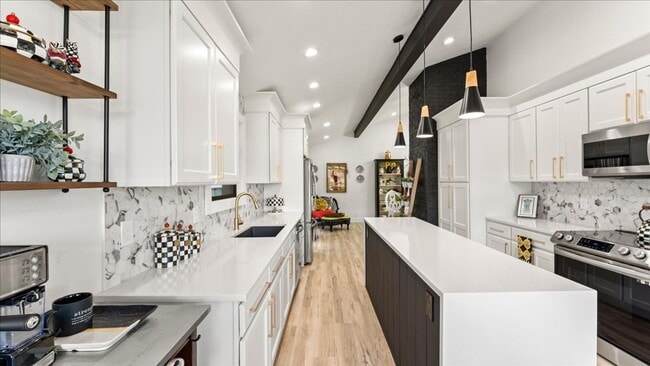 Building Photo - Renovated Mid-Century Modern Home in Belmont West with Finished Basement & Fenced Yard