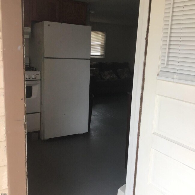 Building Photo - 9317 Monmouth Ave