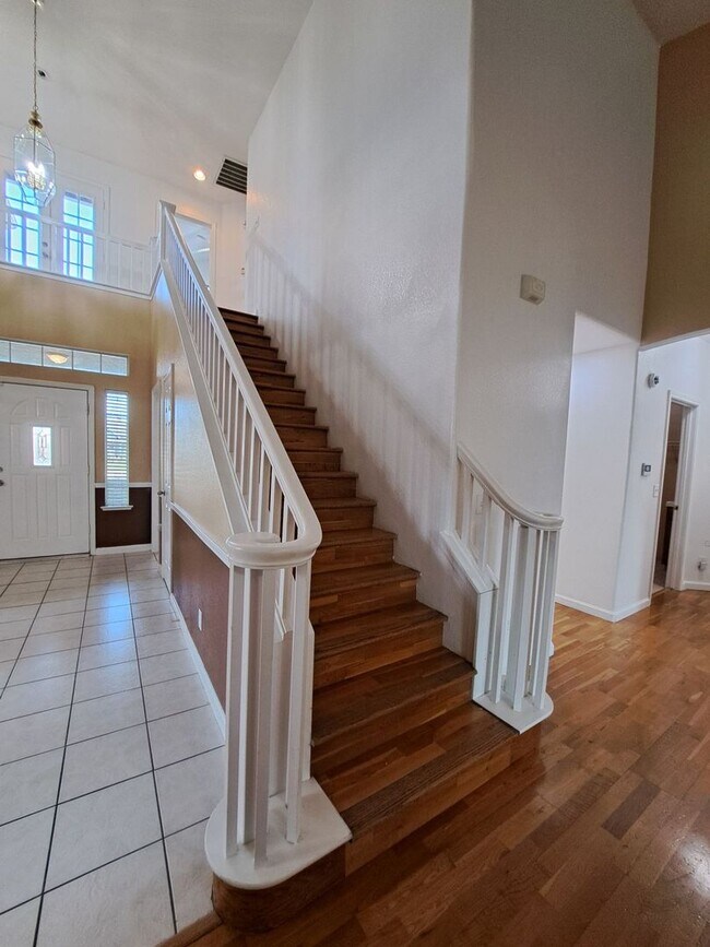 Building Photo - Move in Special: Half OFF your 1st Month's Rent! Elegant 4 Bedroom Home w/ Upstairs Loft Move in ...
