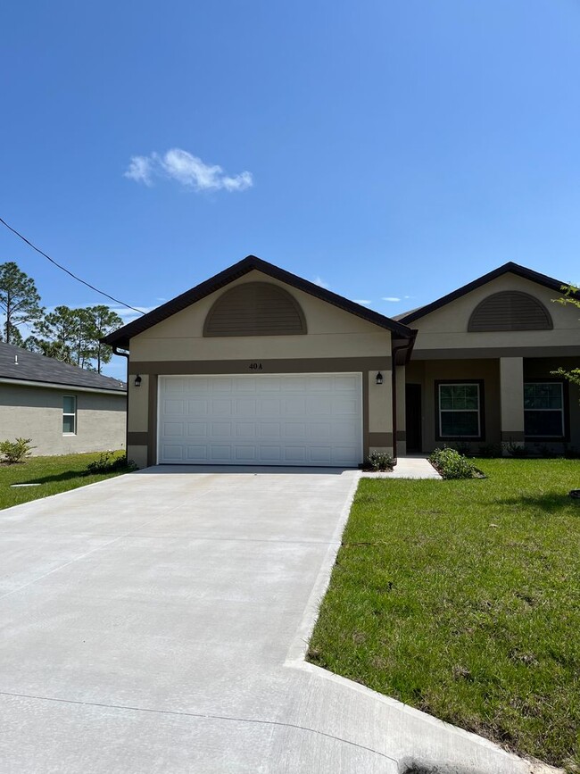 Building Photo - Newer 3bdr/2ba in the heart of Palm Coast!