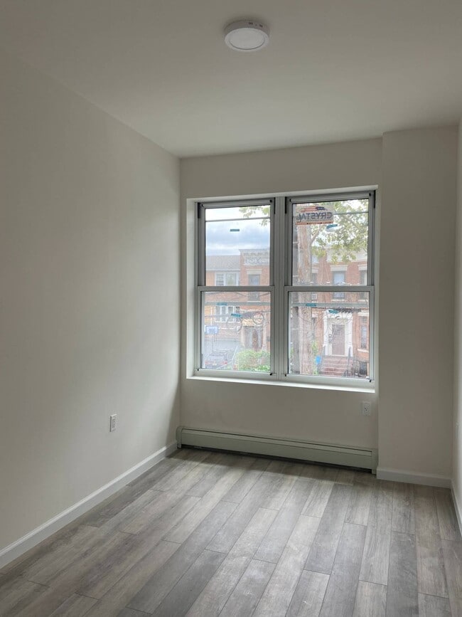 Building Photo - 7118-7110 10th Ave