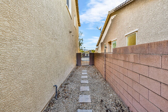 Building Photo - Modern, Guard Gated, and Close to Everything! 3-Bed Townhome Near St. Rose Parkway and Liberty Hi...