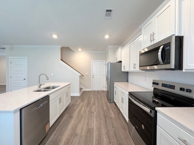 Building Photo - Just Built Beautiful comfortable, open con...