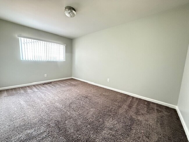 Building Photo - College View Estates Gem – Spacious 3BR Home with Private Yard & RV Parking