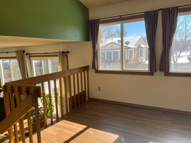 Peaceful backyard view with 4 windows and sliding door - 2619 15th Ave