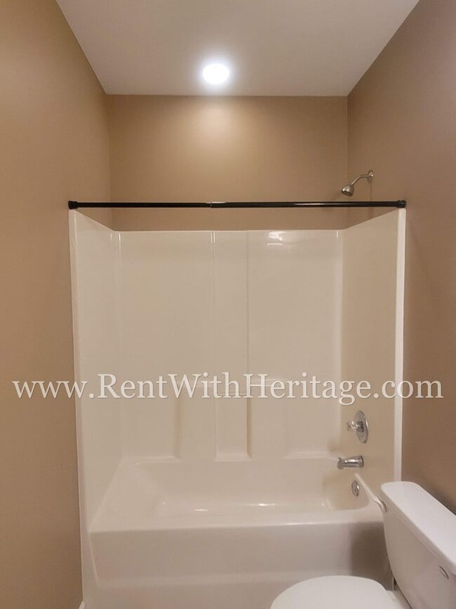 Building Photo - Gorgeous 3-Story Brick Home / 2 Fireplaces / Full Finished Basement / Chapel Hill Schools