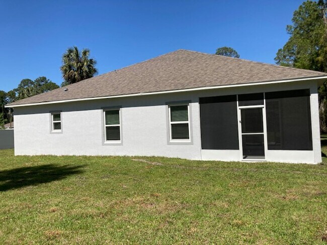 Building Photo - Like New 3 bedroom + den with French doors...