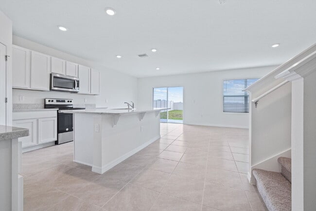 Building Photo - "Spacious 5-Bedroom Retreat with 3 Full Baths in Epperson Lagoon Wesley Chapel – 2,601 Sq. Ft. of...