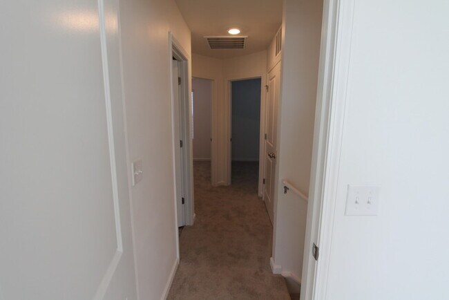 Building Photo - NEW 3 Bedroom Townhome Minutes from Downto...