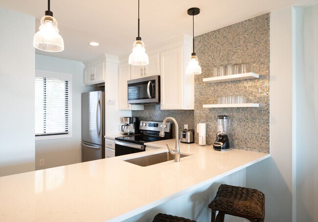 Building Photo - OFF-SEASON FURNISHED MONTHLY RENTAL STARTI...