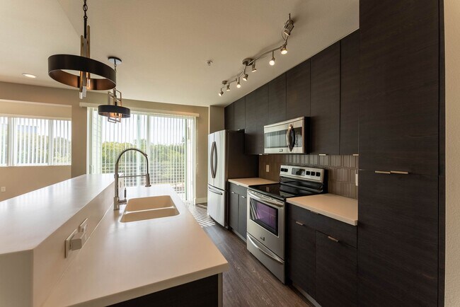 Building Photo - Discover the Ultimate in South Austin Living at Skybridge Lofts - Modern 2 Bedroom, 2.5 Bathroom ...