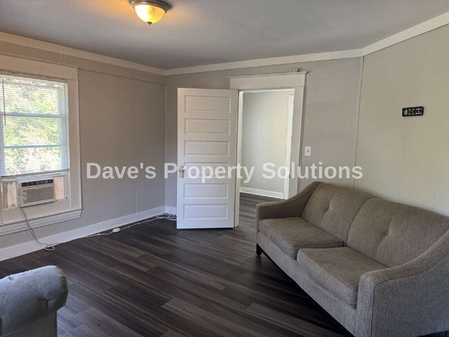 Building Photo - Move-In Ready Upstairs Unit | New Flooring, Eat-In Kitchen & Tons of Closets
