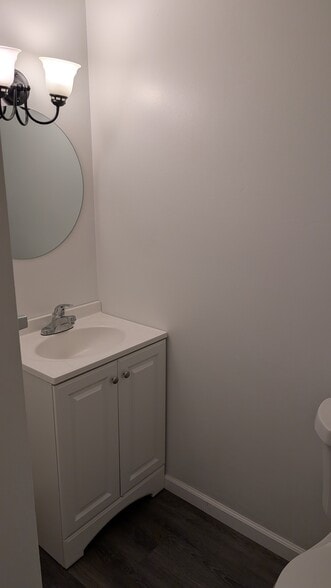 first floor half bath - 7227 Seymour St NW
